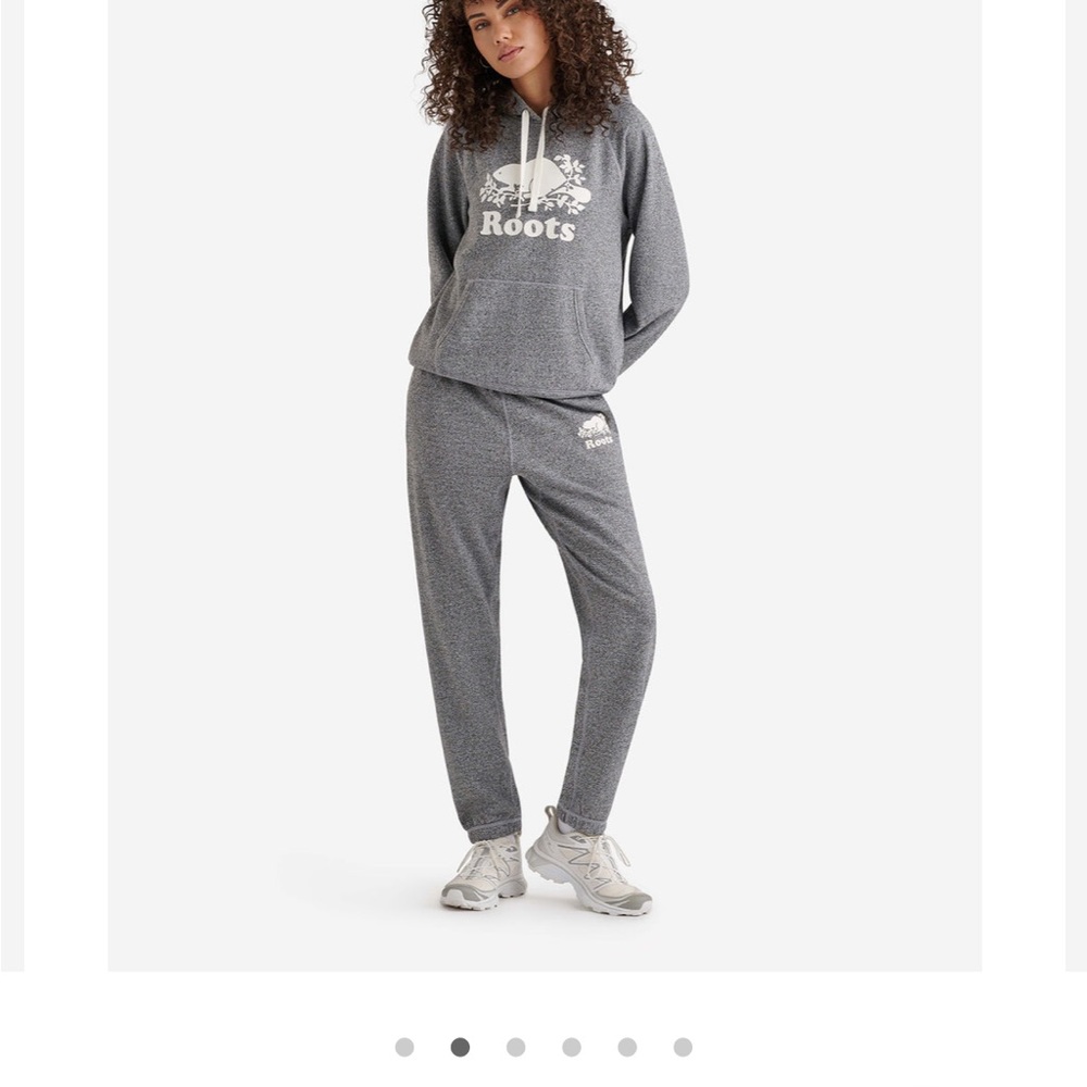 Root’s original grey sweatpants with writing on back